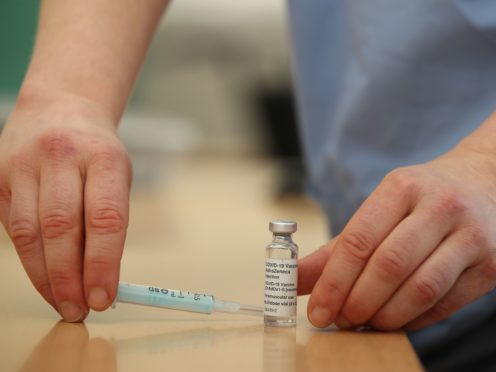 The Oxford/AstraZeneca coronavirus vaccine is prepared for use (PA)