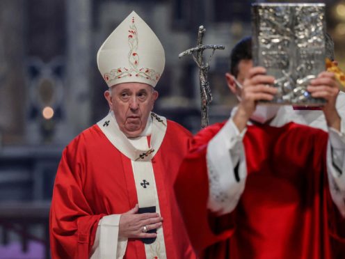 Pope Francis celebrates Palm Sunday Mass in Saint Peter’s Basilica at the Vatican, Sunday, March 28, 2021. (Giuseppe Lami/Pool photo via AP)