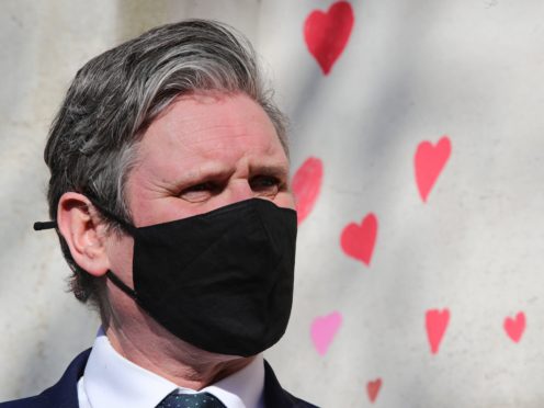 Labour Party leader Keir Starmer visits the Covid-19 memorial wall (Aaron Chown/PA)