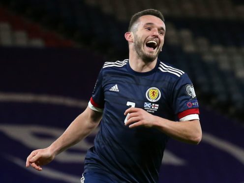 John McGinn celebrates his second goal (Andrew Milligan/PA)