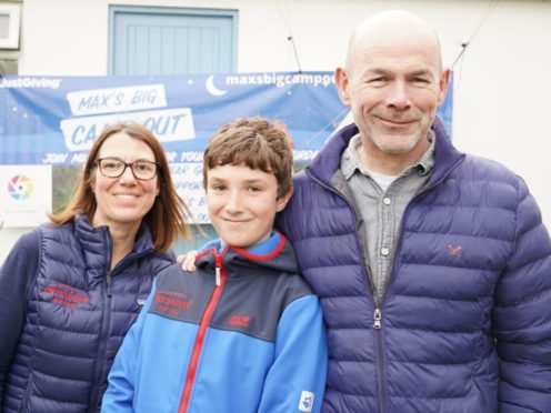 Max Woosey has raised more than £500,000 for a hospice by sleeping in a tent in his garden for a year (Woosey family/PA)