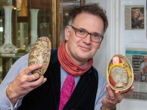 Auctioneer Charles Hanson with the 1924 Easter egg (Mark Laban/Hansons/PA)