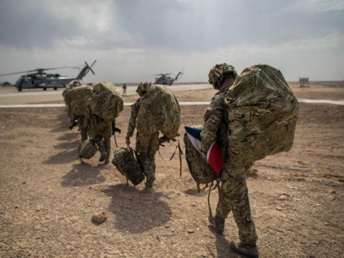 The Government is to exempt torture and genocide from new legal safeguards for troops serving overseas (Ben Birchall/PA)