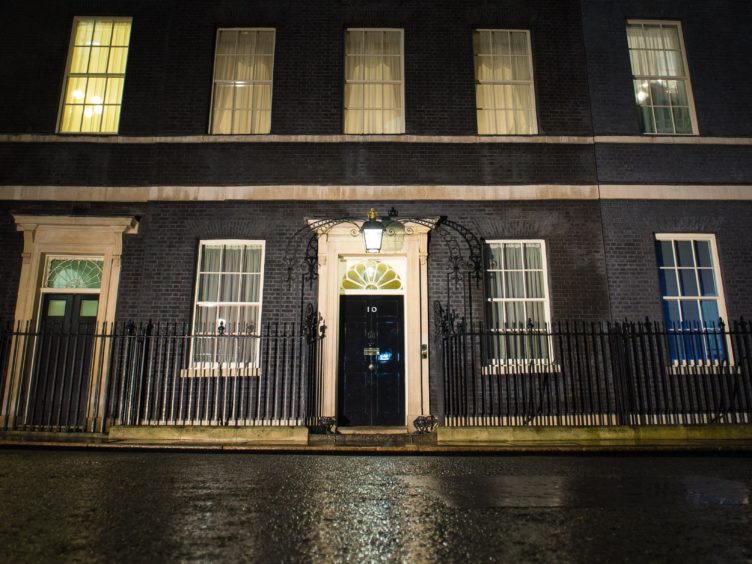 General view of 10 Downing Street, London, in the rain (Dominic Lipinski/PA)