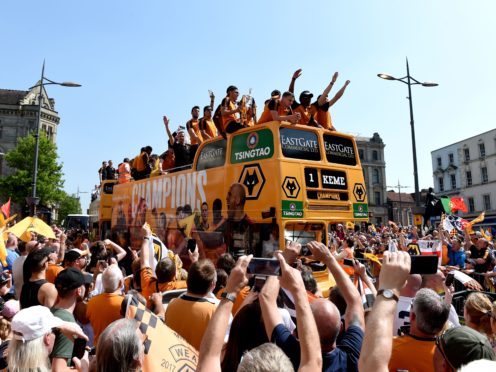Wolves, seen here after winning the 2017/18 Championship, are now claiming a Premier League title too (Joe Giddens/PA)