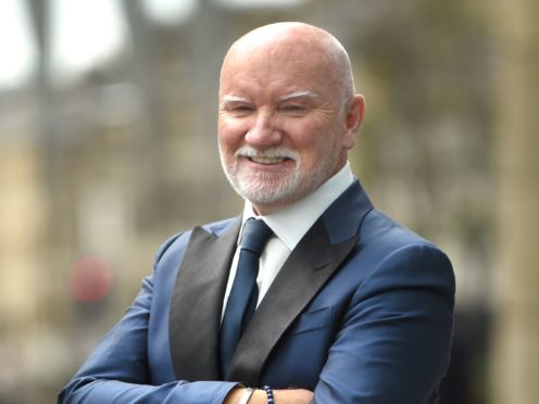 Sir Tom Hunter has given £300,000 in grants and £200,000 in loans (Lesley Martin/PA)