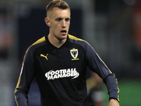 Wimbledon’s Joe Pigott scored late on to earn his side a point (Mike Egerton/PA)
