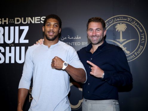 Eddie Hearn, left, is convinced a fight between Anthony Joshua, right, and Tyson Fury will go ahead this summer (Nick Potts/PA)