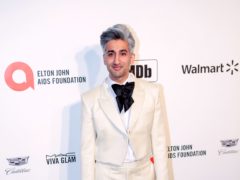 Queer Eye star Tan France has announced he and his husband are expecting a child via surrogate (PA)