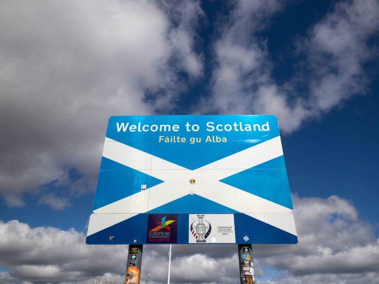 The report examines what lessons Scotland can learn from international examples on immigration (Jane Barlow/PA)