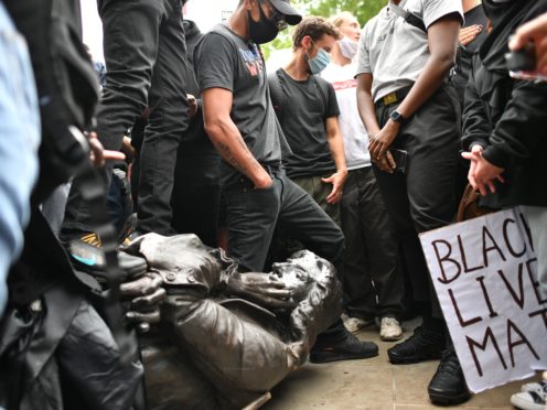 Protesters pull down a statue of Edward Colston (Ben Birchall/PA)