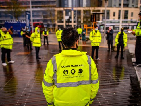 Some councils in England are recruiting Covid marshals for the year ahead (Ben Birchall/PA)