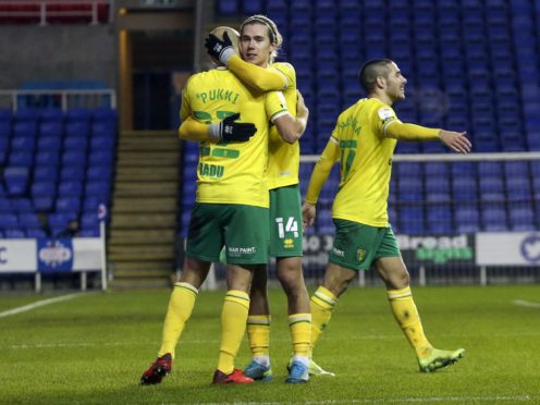 Todd Cantwell (centre) and Emi Buendia (right) have again proved key to Norwich’s promotion hopes (Steve Parsons/PA)