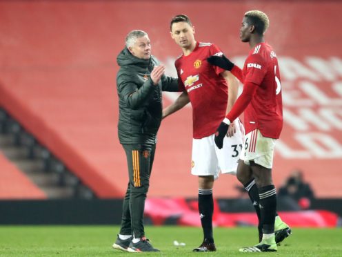 Ole Gunnar Solskjaer says the red stadium wrap at Old Trafford has been problematic (Martin Rickett/PA)