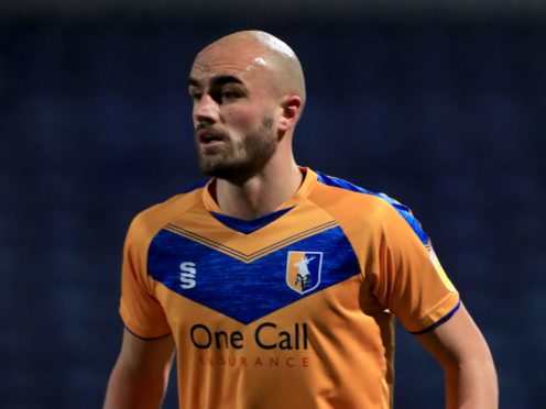 Mansfield will be without Farrend Rawson against Oldham (Mike Egerton/PA)