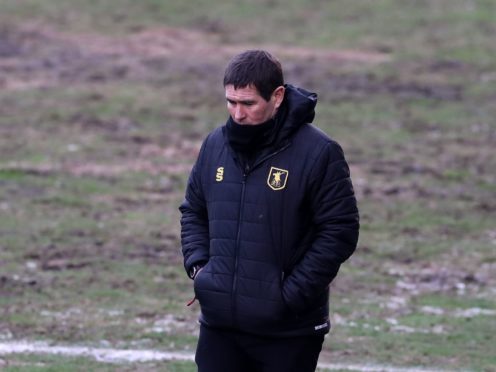 Nigel Clough’s Mansfield secured their League Two status on Tuesday night (Gareth Fuller/PA)