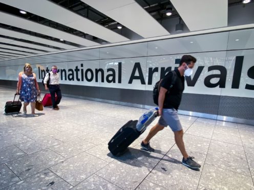 A report has outlined how international travel could resume from May 17 (Aaron Chown/PA)