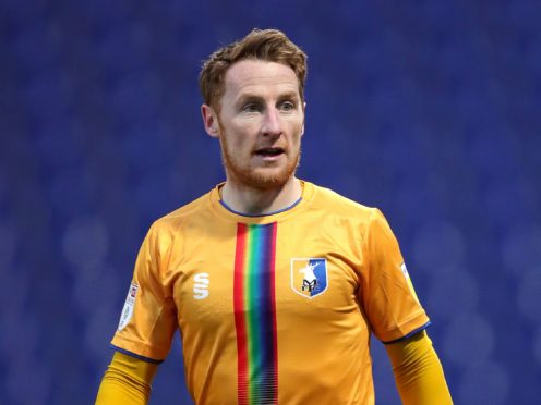 Mansfield’s Stephen Quinn will miss the match with Scunthorpe (Simon Marper/PA)
