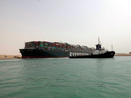 The Ever Given after it become wedged across the Suez Canal (Suez Cabal Authority/AP)