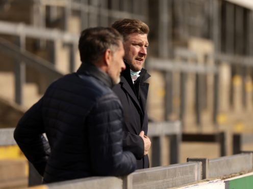 Karl Robinson watched Oxford’s match at Crewe in the stand (Steven Paston/PA)