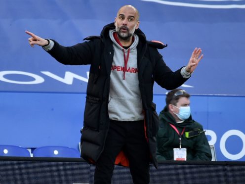 Pep Guardiola has urged his Manchester City side to get on the front foot against Borussia Dortmund (Rui Vieira/PA)