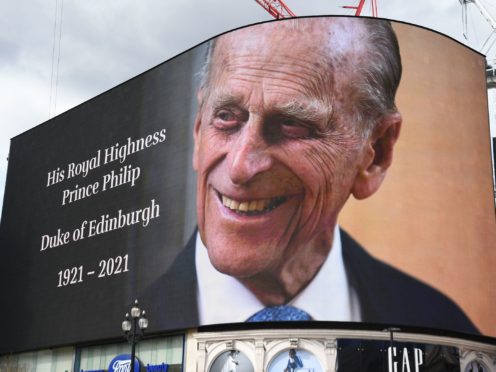 A tribute to the Duke of Edinburgh, which will be shown for 24 hours, on display at the Piccadilly Lights in central London (Kirsty O’Connor/PA)