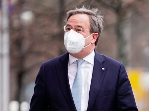 Armin Laschet, CDU federal chairman and minister president of North Rhine-Westphalia, arrives at the CDU presidium meeting in front of party headquarters in Berlin, Germany (Michael Kappeler/dpa via AP)