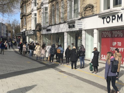 Shoppers in Cardiff. Nearly three-quarters (72%) of people said they had been able to make some savings on outgoings over the past 12 months, LV= said (Adam Hale/PA)
