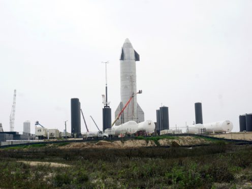 Nasa has chosen SpaceX to build the lunar lander that will eventually put the first woman and person of colour on the moon (Miguel Roberts/The Brownsville Herald/AP)