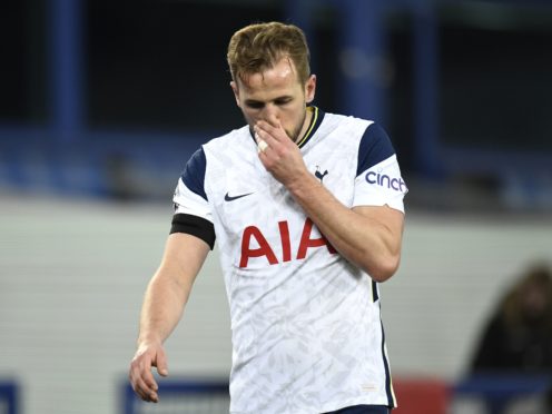 Harry Kane was forced off with an ankle injury during Tottenham’s draw with Everton (Peter Powell/PA).