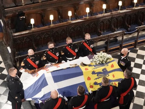 The Queen watches as the coffin of the Duke of Edinburgh is placed in St George’s Chapel (Jonathan Brady/PA)