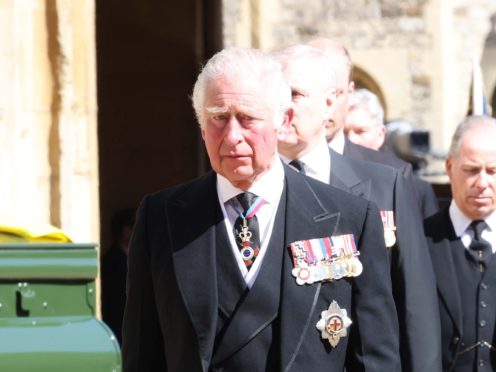 The Prince of Wales follows the Land Rover Defender carrying the Duke of Edinburgh’s coffin (Ian Vogler/Daily Mirror/PA)