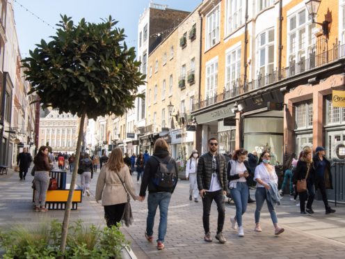 Merchants on South Molton Street welcome customers back to the neighbourhood of Mayfair/ Belgravia (Matt Crosick/PA)
