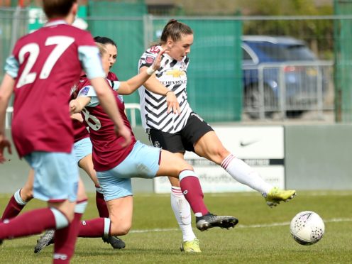Kirsty Hanson (right) scores Manchester United’s fifth goal in their 6-0 Vitality Women’s FA Cup win at Burnley (Tim Markland/PA)