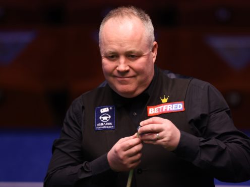 John Higgins battled to victory over Tian Pengfei (George Wood/PA)