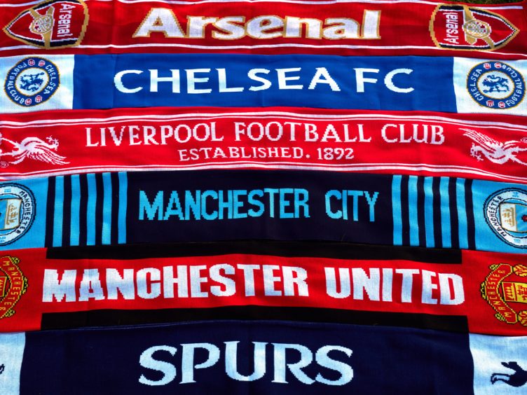Football scarves (John Walton/PA)