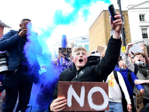 Fans protest against Chelsea’s involvement in the new European Super League outside Stamford Bridge (Ian West/PA)