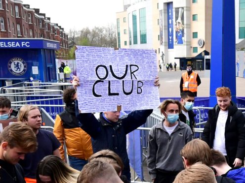 Fans protest against Chelsea’s involvement in the new European Super League outside Stamford Bridge (Ian West/PA Images).