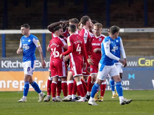 Gillingham’s Connor Ogilvie celebrates opening the scoring (Zac Goodwin/PA)