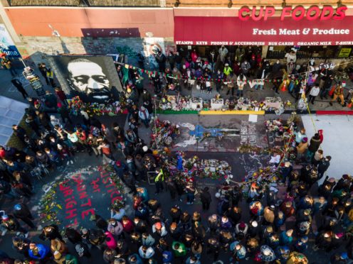 A crowd gathers at George Floyd Square after a guilty verdict was announced at the trial of former Minneapolis police Officer Derek Chauvin (Julio Cortez/AP)