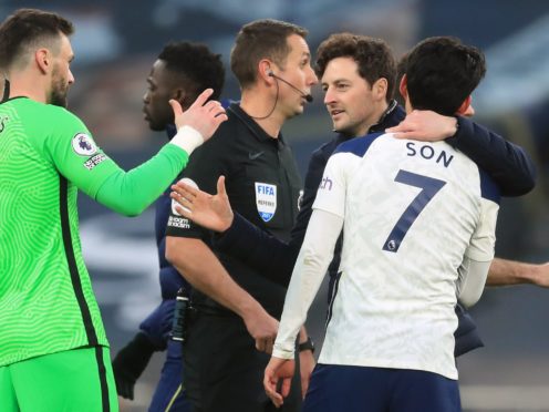 Hugo Lloris. left, says Ryan Mason is already equipped to be a manager (Adam Davy/PA)