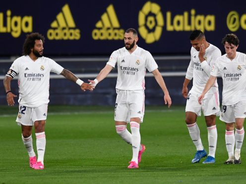 Real Madrid frontman Karim Benzema (second left) again proved too hot to handle against Cadiz (Jose Breton/AP/Press Association Images)