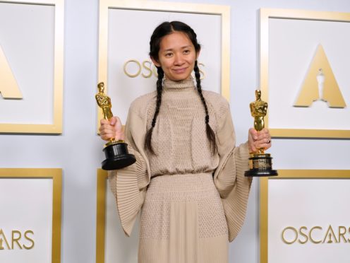 Chloe Zhao with the best picture and best director Oscars for Nomadland. The ceremony’s TV viewing audience dropped to a new low this year (Chris Pizzello/AP)