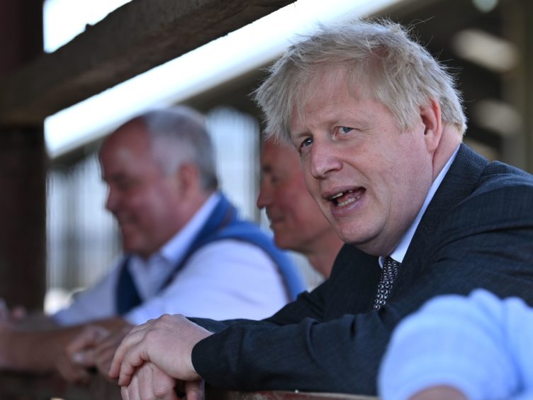 Boris Johnson was earlier accused of saying he would rather see ‘bodies pile high in their thousands’ (Paul Ellis/PA)