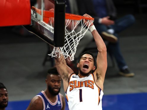 Devin Booker helped the Suns get back to winning ways (Elsa/Pool/AP)