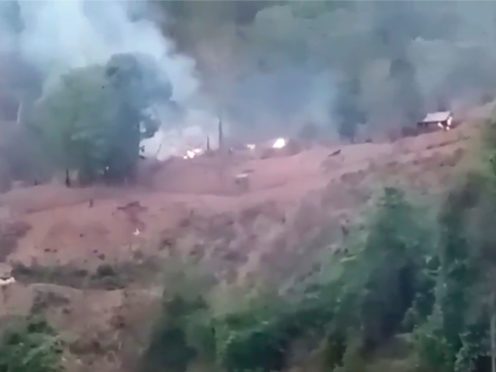 In this image made from video by the Transborder News, smoke rises from a Myanmar Army camp near the border of Myanmar and Thailand Tuesday, April 27, 2021. Ethnic Karen guerrillas said they captured a Myanmar army base Tuesday in what represents a morale-boosting action for those opposing the military’s takeover of the country’s civilian government in February. (Transborder News via AP)