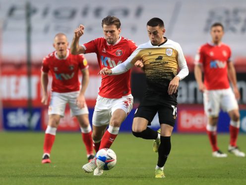 Ben Purrington (left) and Crewe striker Owen Dale battle for the ball (Adam Davy/PA)