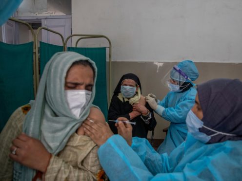 Kashmiri women receive Covishield vaccine for Covid-19 at a primary health center in Srinagar, Indian controlled Kashmir (Dar Yasin/AP)