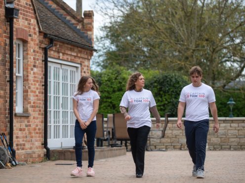 Captain Sir Tom Moore’s daughter Hannah Ingram-Moore and his grandchildren Georgia and Benjie take part in the Captain Tom 100 challenge (Joe Giddens/PA)