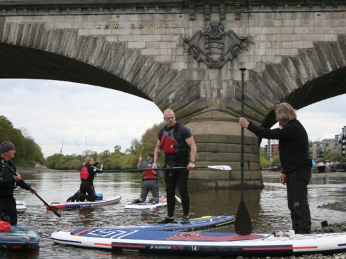 James Haskell, Charley Boorman, Dean Stockton and the training instructors prepare to start training on the River Thames (Luciana Guerra/PA)